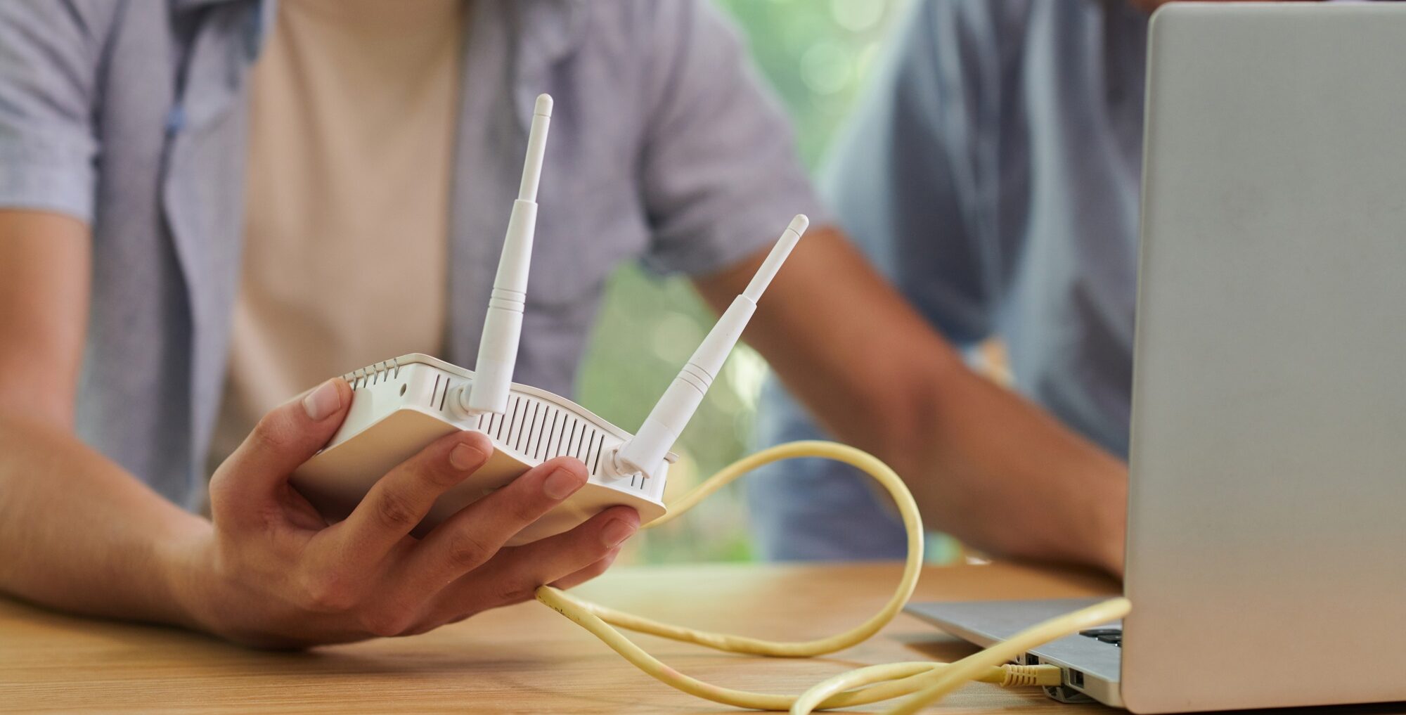 Man Installing Wi-Fi Router