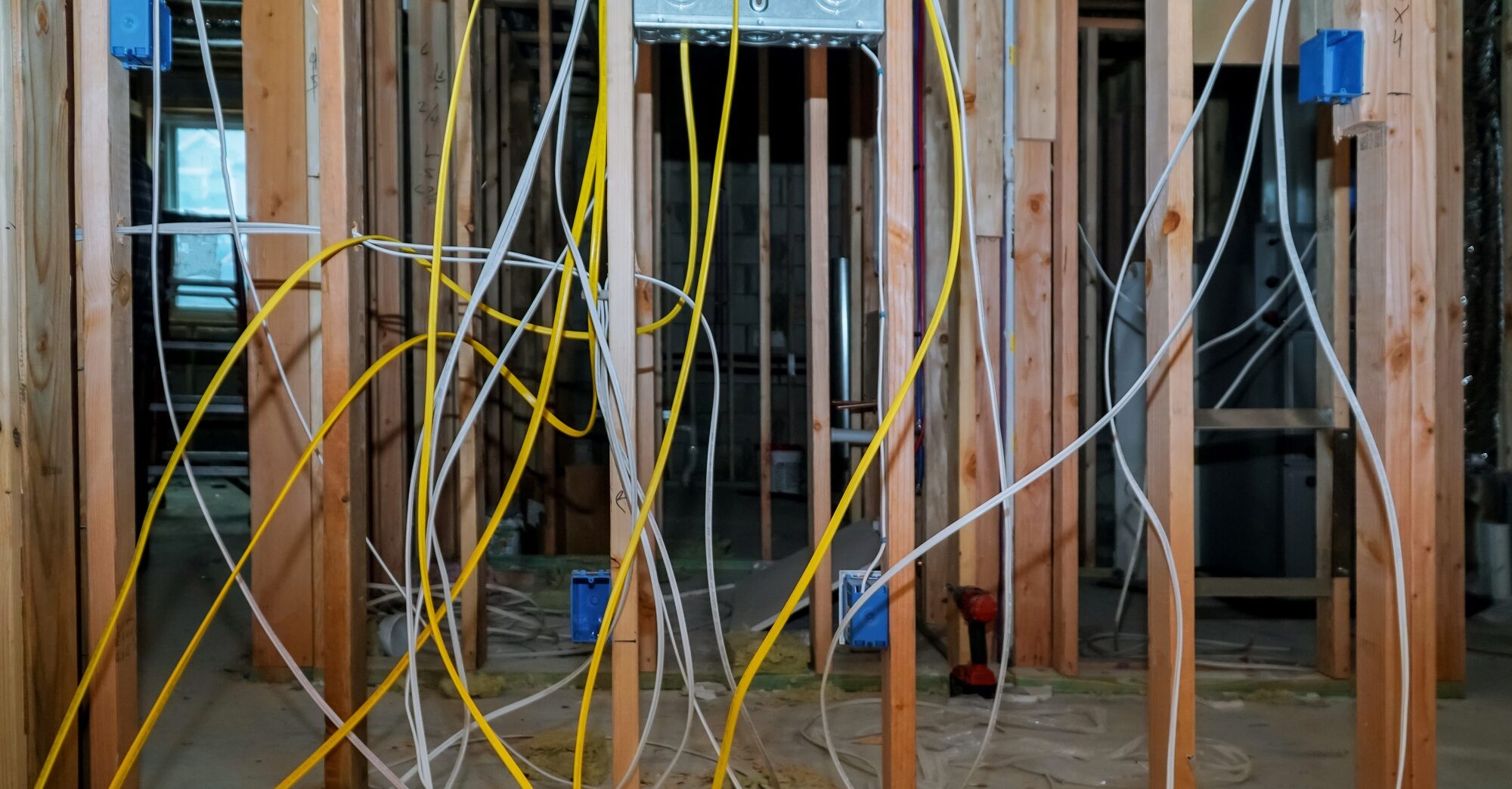 New electric installation at wooden house of wiring in a new home